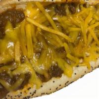 Chili Cheese Dog · 100% beef Vienna Hot dog topped with Chili and Cheese on a poppy seeds Bun