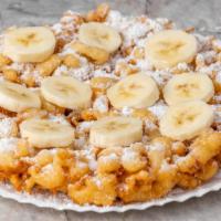 Banana Works · Top off your classic funnel cake with bananas and your choice of additional toppings as desi...