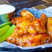 Boneless Wings · 10oz of succulent, breaded chicken fillets, tossed in one of our housemade wing sauces, serv...