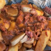 Poutine · Chips, cheese and gravy.