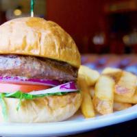 Pub Burger · 1/2lb prime beef patty seasoned with Three Lions' seasoning and grilled.  Served on a brioch...