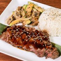 Beef Teriyaki · N. Y. strip steak grilled then glazed with homemade teriyaki sauce.