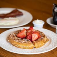 Michelle'S Waffle Dream · Our golden-brown Belgian waffle served with whipped butter plus two eggs any style and your ...