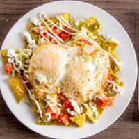 Chilaquiles Verdes O Rojos · Corn tortillas chips dipped in our homemade green salsa topped with Pepper Jack cheese, sour...