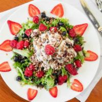 Garden Berry Salad · Spring mix greens, topped with a generous scoop of chicken salad, raspberries, strawberries,...