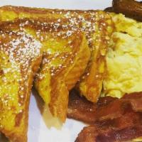 French Toast · Dipped in our special batter and served with plenty of butter and syrup.