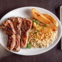 Lamb Chops · Three chops broiled in lemon, butter, and oregano for extra flavor. Served with Greek potato...