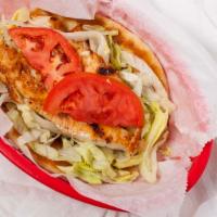 Grecian Chicken Breast On Pita · With lettuce & tomatoes