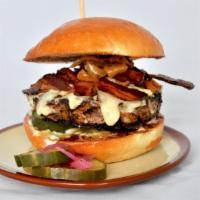 Cbgb Burger · House-ground smoked brisket, smoked gouda schmear, smoked bacon, caramelized onion, duke's m...