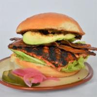 Salmon Blt Club · Wood-grilled salmon, avocado, double-smoked bacon, lettuce, tomato jam, BBQ mayo, egg bun.