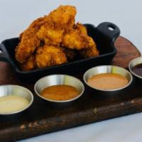 Smoked Chicken Nuggets · Country-fried smoked chicken bites; spicy tiger BBQ, barbecue ranch, 'bama white BBQ, caroli...