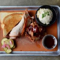 Pick 2 Meats · Choice of pulled pork butt, hand-cranked sausage, turkey breast, black angus brisket or smok...