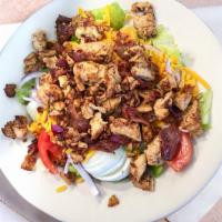 Geroge'S Salad · Grilled chicken with bacon, lettuce, tomatoes, green peppers, onions, hard-boiled egg, and s...