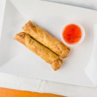 2 Chicken Spring Rolls · Chicken, noodles, cabbage, carrots and a side of sweet chili sauce.
