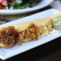 Fried Arepitas · Four small fried arepas stuffed with our most popular fillings: chicken avocado salad, Gouda...