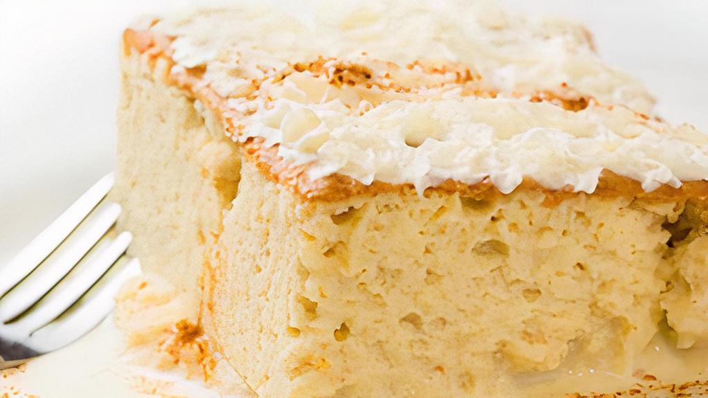 Torta 3 Leches  · This is a sponge cake soaked in a mixture of three kinds of
milk, topped with whipped cream