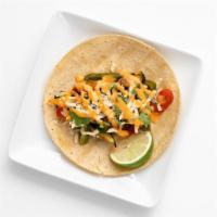 Veggie Taco · Sauteed and seasoned bell pepper, Portobello mushrooms, zucchini with chihuahua cheese and c...