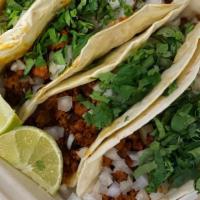 Flour Tacos · Tortilla, meat, onion, cilantro, salsa and lime on the side