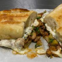 Full Torta · sliced baguette bread with mayo, beans, meat of your choice, cheese, onion, cilantro, salsa,...