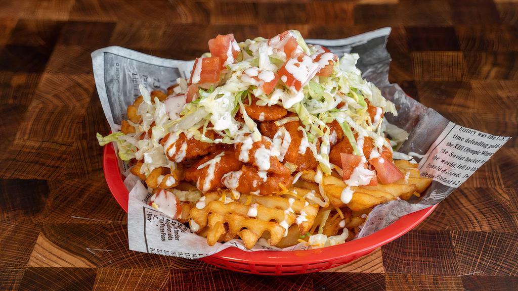 Loaded Cyber Fries · Waffle Fries Loaded with Popcorn Chicken, Buffalo Sauce, Shredded Cheddar Cheese, Lettuce, Tomato, and Ranch Drizzled on Top