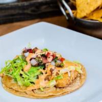 Fish Tako · Fish tako with chipotle mayo, pico de gallo, spring mix, and avocado