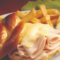 Turkey O'Toole · Freshly sliced turkey breast, melted Swiss cheese and smoky honey Dijon dressing. served on ...