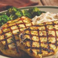 Danny Boy Chicken · Two grilled garlic-marinated chicken breasts served with roasted garlic mashed potatoes and ...