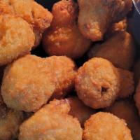 Mushrooms: Breaded · Generous portion of plump mushrooms that are lightly battered and fried. Served with ranch d...