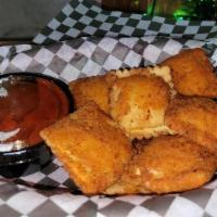 Toasted Ravioli · Ravioli stuffed with a ricotta cheese filling then lightly tossed in bread crumbs then fried...