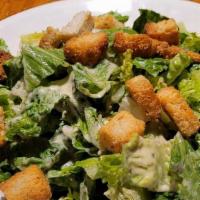 Caesar Salad · Fresh romaine lettuce topped with creamy Caesar dressing, parmesan and croutons. Dressings c...