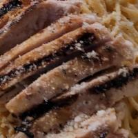 Lemon Pepper Chicken Pasta · Pasta is tossed in olive oil with a special blend of lemon and black pepper seasoning. Toppe...