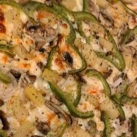 Veggie Pizza · Looking to go the guilt-free route? Mushrooms, onions, green peppers, tomatoes and black oli...