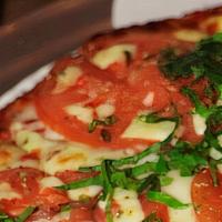 Margherita Pizza · Our original pizza sauce or olive oil base…your choice! Topped with our freshly shredded moz...