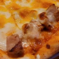 Buffalo Chicken Pizza · Choose between grilled or breaded chicken that is diced  then spread over our unique blend o...