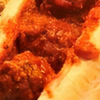 Meatball Sandwich · Three of our large meatballs are served in a French Roll and bathed in our own marinara sauc...