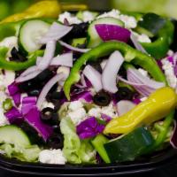 Greek Salad · Cucumbers, green peppers, tomatoes, red onions, red cabbage, Kalamata olives, Feta cheese an...