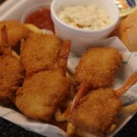 Shrimp Dinner · Six jumbo shrimp are lightly breaded and fried crispy, served with fries, coleslaw and cockt...