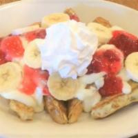 Strawberry & Banana · Our French toast covered with cheesecake filing, strawberry topping, sliced banana and whipp...