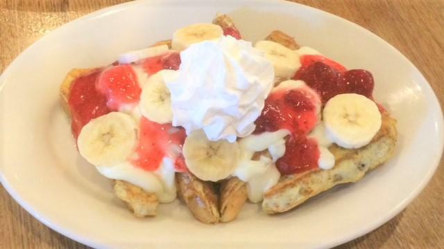 Strawberry & Banana · Our French toast covered with cheesecake filing, strawberry topping, sliced banana and whipped topping.