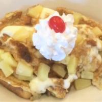 Pineapple Upside-Down · Our French toast covered with cheesecake filing, cinnamon, brown sugar, pineapple and whippe...
