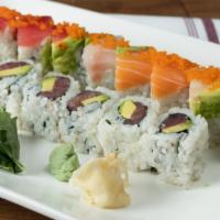 Rainbow Roll · Inside crabmeat, avocado topped with tuna, salmon, shrimp, white fish and tobiko. Raw.