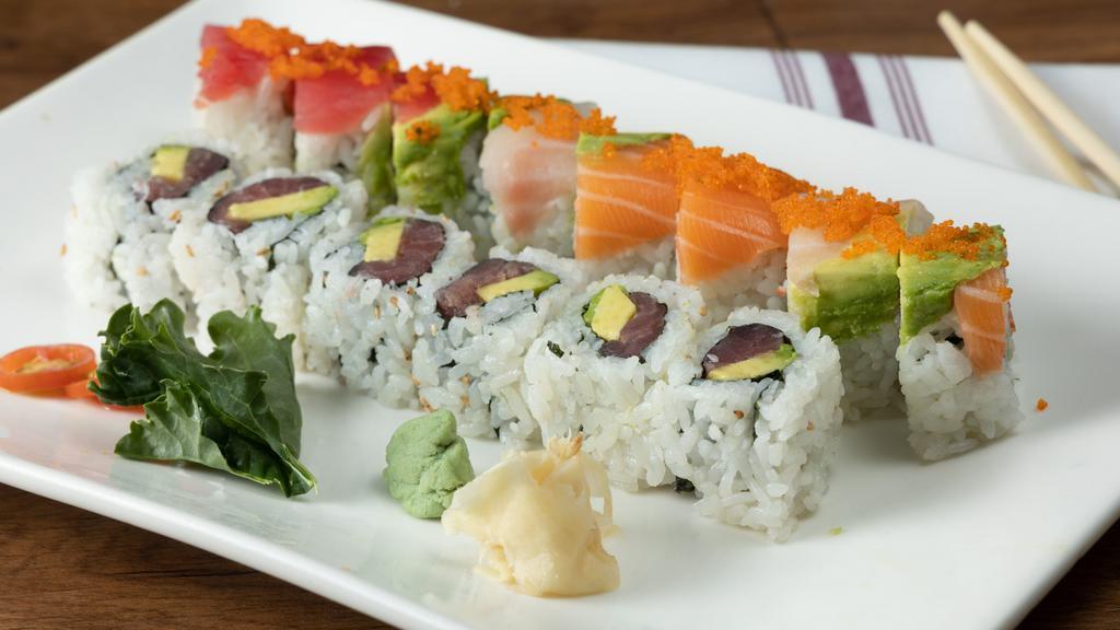 Rainbow Roll · Inside crabmeat, avocado topped with tuna, salmon, shrimp, white fish and tobiko. Raw.