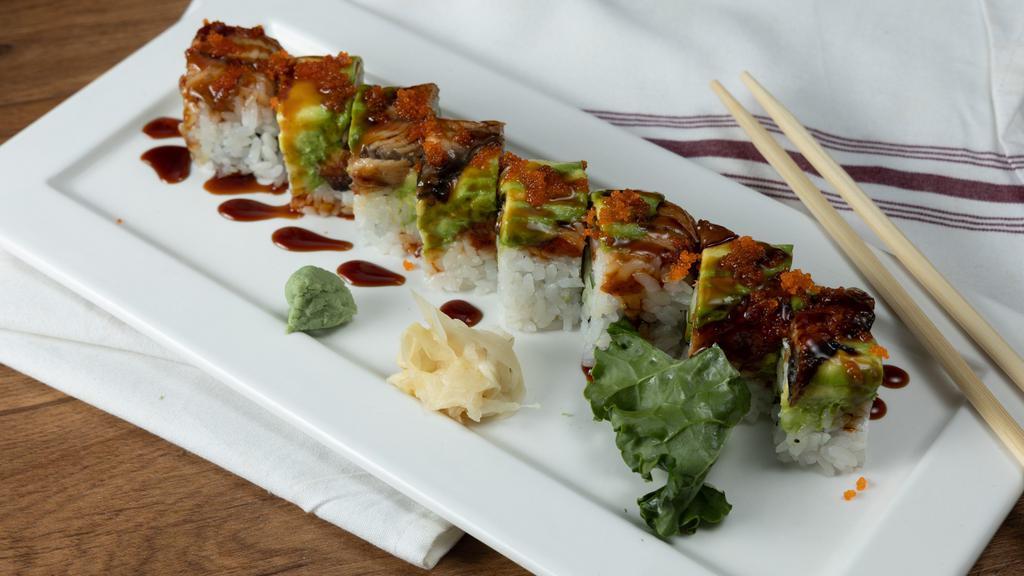 Dragon Roll · Crabmeat, cucumber topped with eel, avocado, eel sauce.