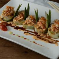 Yamato Roll · Lobster, salad, avocado, cream cheese, spicy crabmeat with eel master sauce.