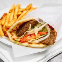 Gyros Sandwich · Gyros meat, lettuce, tomatoes, onion, and tzatziki sauce wrapped in pita bread.
