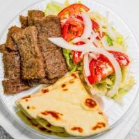 Gyros Dinner · Gyros meat, pita bread, tzatziki sauce, salad, and drink.