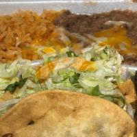 3# Beef Tacos Combo (2 Pieces) · Two beef tacos and side of beans and rice.