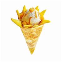 Mango Deluxe Crêpe · Fresh mango, mango jelly, dry mango, mango compote, vanilla ice cream, honey whipped yogurt,...