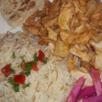 Chicken Shawarma Plate · Slow roasted and shaved off a rotisserie skewer.