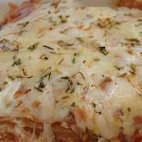 Cheese Lasagna · Garlic bread, red sauce and baked with mozzarella.